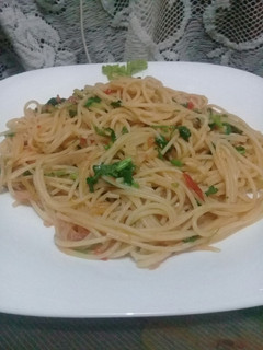 A picture of Spaghetti in tomato dhania sauce.