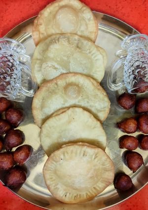 তালের ফুলুরি আর ক্ষীরপুরী(Taler fulori ar khirpuri recipe in bengali) রেসিপির প্রধান ছবি