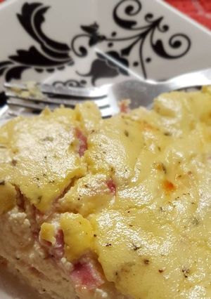 Una foto de Tarta de ricota, jamón y queso. Sutil!
