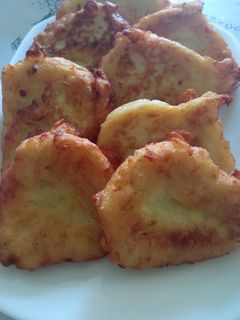 Una foto de Buñuelos de puré de patata y cebolla