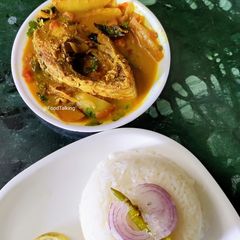 A picture of Ilish Mach Besara/Hilsa Fish Cooked In Mustard Paste.
