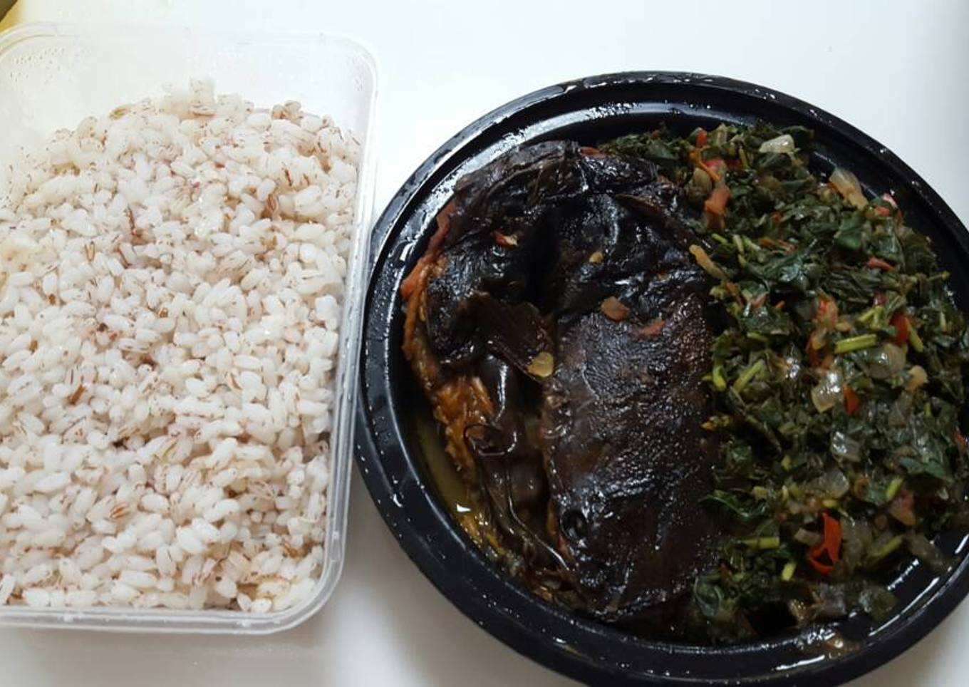Ofada rice with vegetable sauce and dry fish