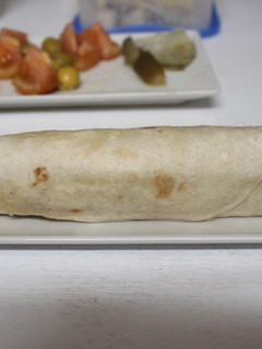Una foto de Tortita rellena de carne picada cocida con mayonesa