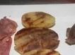 Una foto de Entrecot con bacon y patatas