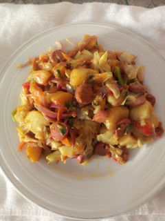 A picture of Plantain and Irish potatoes in curry veggies.