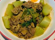 A picture of beef with vegetables