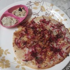 A picture of Onion uttapam.