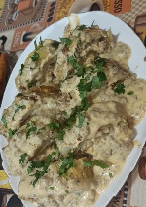 صورة لوصفة رولي البطاطس بصلصة الجبن والفطر