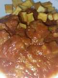 Carne de cerdo con tomate