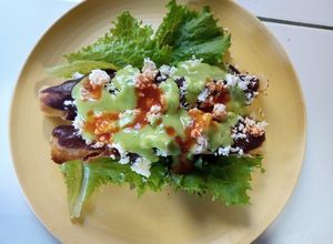 Una foto de Tacos dorados de quesillo