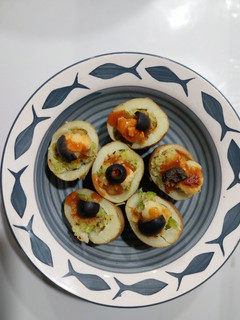 A picture of Jacket potatoes(with poha stuffing).