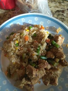 A picture of Veggie rice with Pork and string beans yummy.
