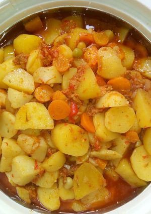 A picture of Irish potatoes in minced meat and veggies.