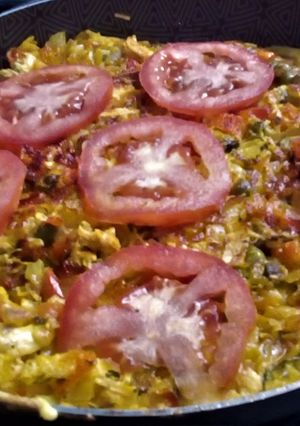 Una foto de Tortilla de Pollo🍗, Huevos🥚 y Verduras