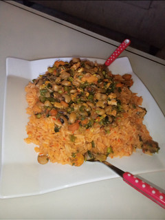 A picture of Jallof rice with beans and veggies in a different form.