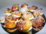 Una foto de profiteroles con margarina