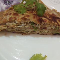 A picture of Egg stuffed paratha.