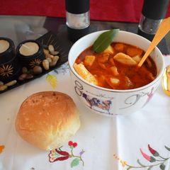 A picture of Hot and spicy potato soup with homemade pasta.