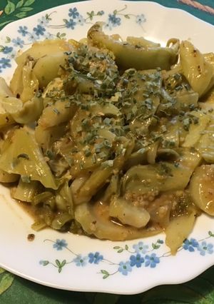 Une photo de Bau chim Kai choï mustard sauté à l ail,citron et gingembre