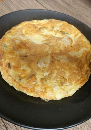 Una foto de Mini tortillas de ajetes y atún