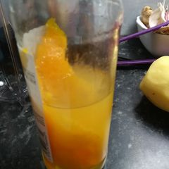 A picture of Orange Essence, or Anti Grease Cleaning Liquid.