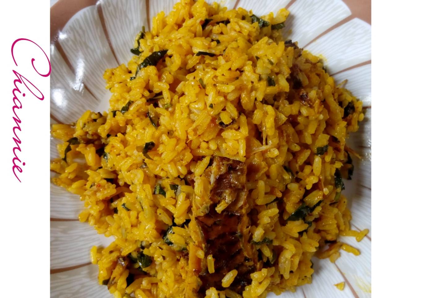Local Jellof Rice With Palm Oil, Scent leaf and Dry Fish