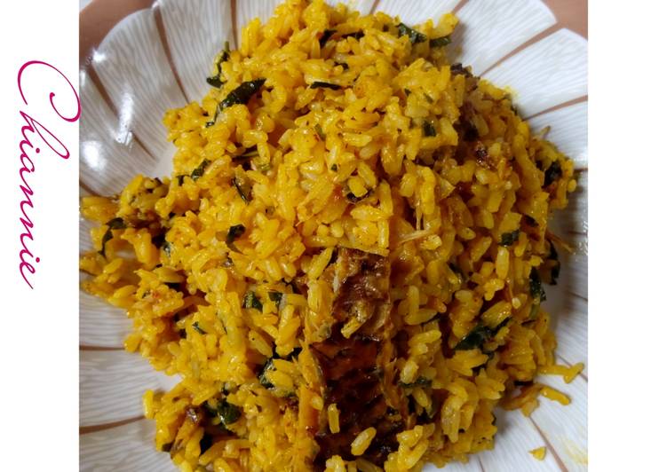 Local Jellof Rice With Palm Oil, Scent leaf and Dry Fish