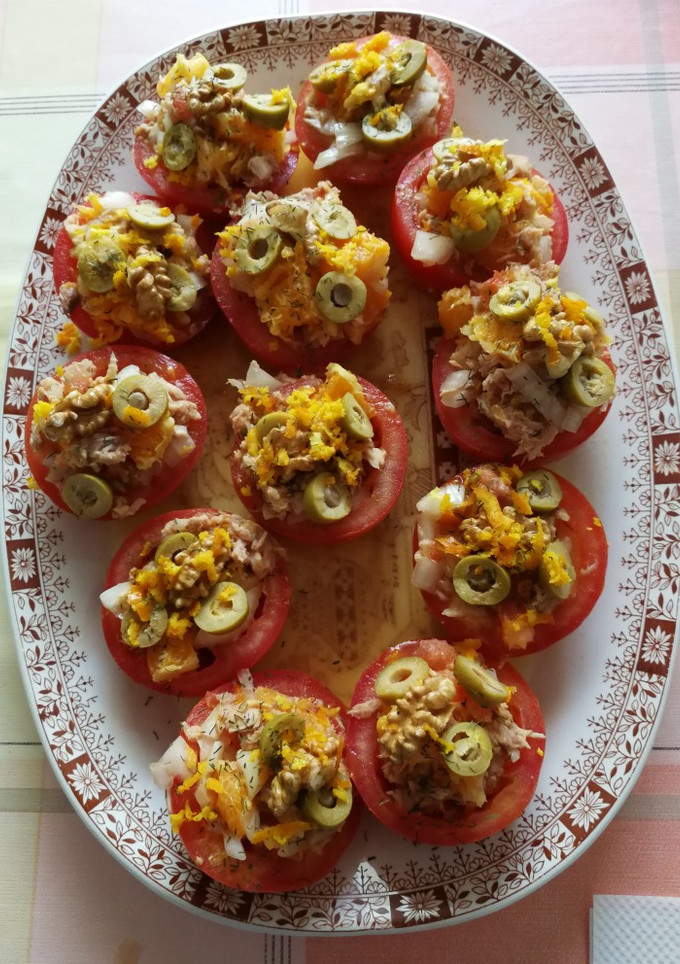 Una foto de Tomates cítricos con vinagreta de naranja