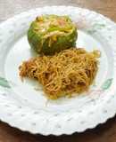 Zapallitos rellenos de surubi con fideos de arroz