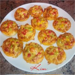 A picture of Mini Chicken tikka pizzas.