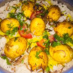 Mix egg and mutton biryani with smokey flavour A picture of Mix egg and mutton biryani with smokey flavour.