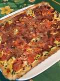 Tarte aux courgettes, tomates, lonzo crème de basilic et épices