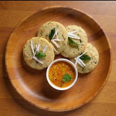 A picture of Carrot - Coriander Idli With Sambar.