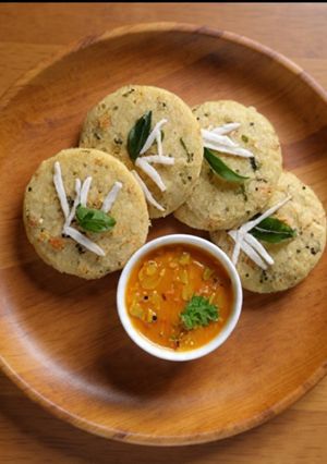 A picture of Carrot - Coriander Idli With Sambar.