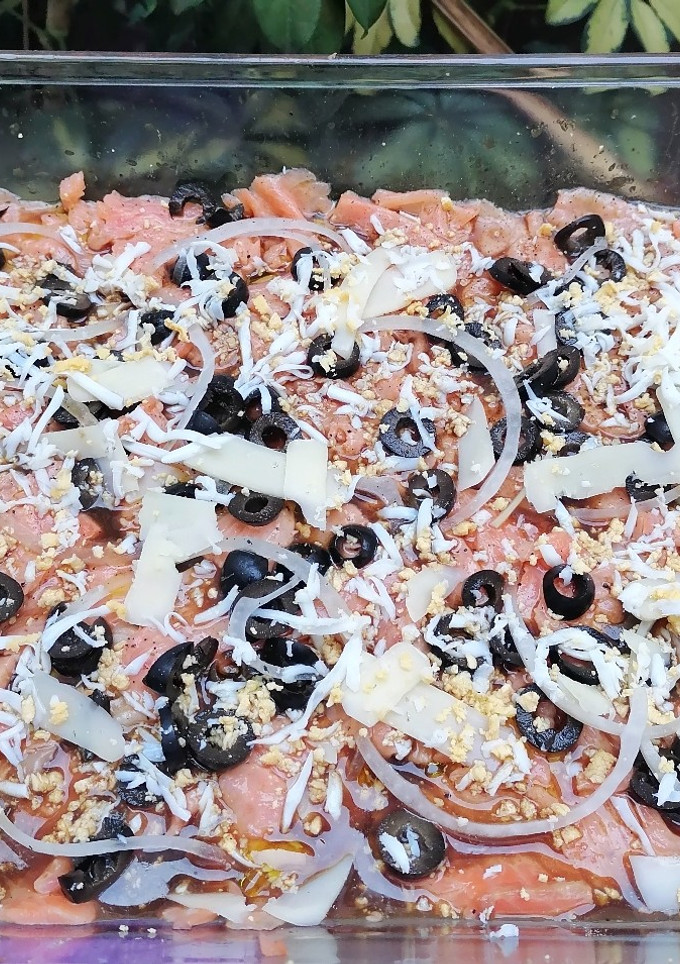 Una foto de Carpaccio de salmón