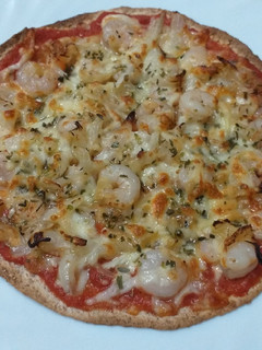 Una foto de Pizza fit con tortilla integral mejicana en freidora de aire