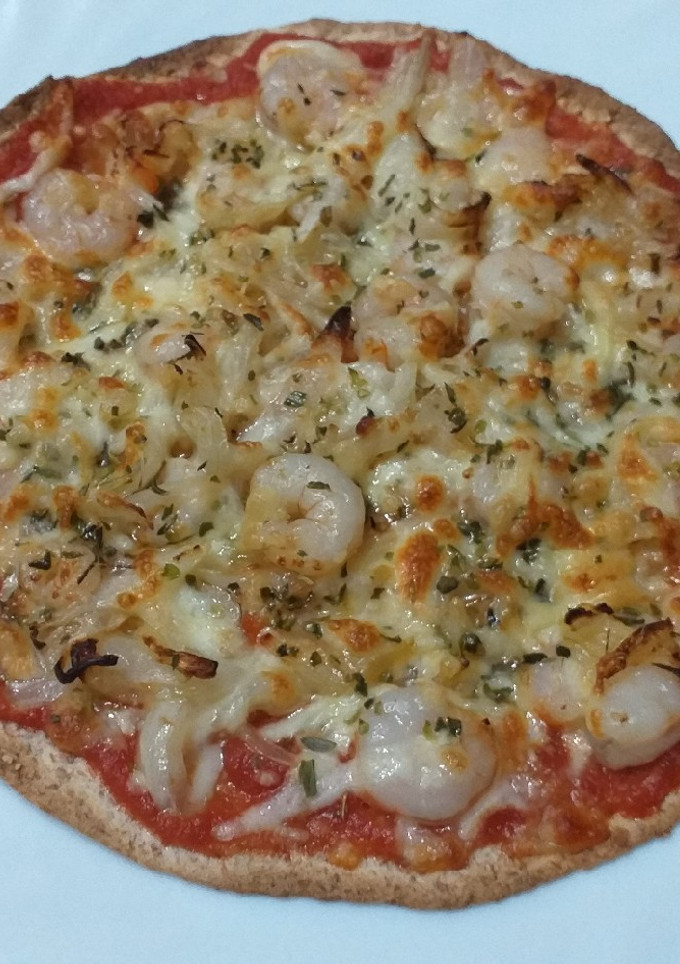 Una foto de Pizza fit con tortilla integral mejicana en freidora de aire