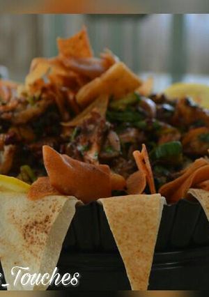 صورة لوصفة سلطة الباذنجان بحبوب الرمان والخبز المحمص