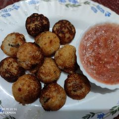 A picture of Leftover Rice Appam with Tomatoes Chutney.