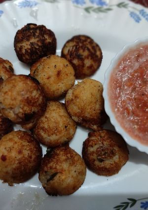 A picture of Leftover Rice Appam with Tomatoes Chutney.