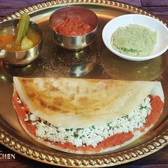 A picture of Paneer Dosa, Sambhar and Coconut Chutney.