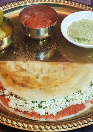 A picture of Paneer Dosa, Sambhar and Coconut Chutney.