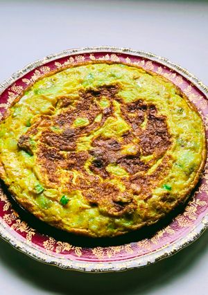 Una foto de Tortilla de puerro y cebolla de verdeo