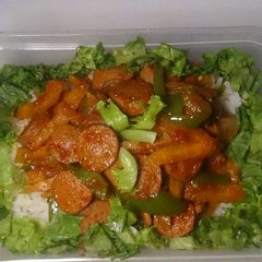 A picture of Rice and vegetable sausage stir fry.