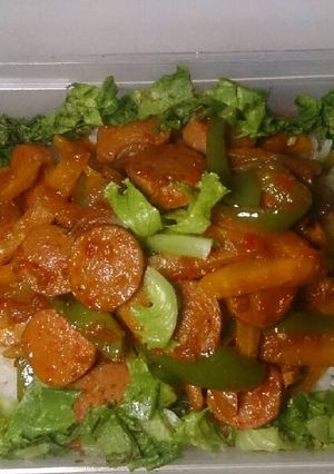 A picture of Rice and vegetable sausage stir fry.