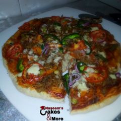 A picture of My homemade vegetable pizza.