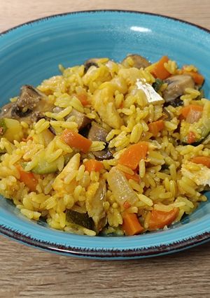 Una foto de Arroz con bacalao y calabacín