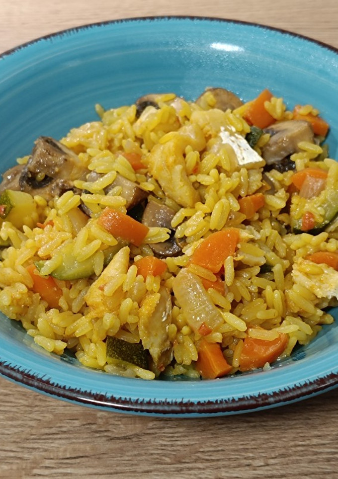 Una foto de Arroz con bacalao y calabacín