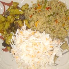 A picture of Cous cous with couslow.