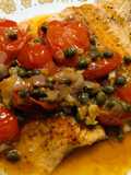 Steelhead trout with spicy tomato and caper sauce